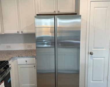 6406 Kemper Pl - Photo Thumbnail 3