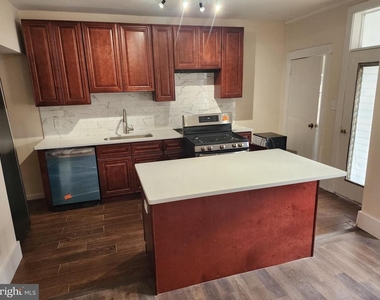 4621 Woodland Avenue - Photo Thumbnail 5