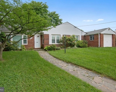 9702 Bellevue Drive - Photo Thumbnail 1