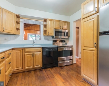 9702 Bellevue Drive - Photo Thumbnail 10