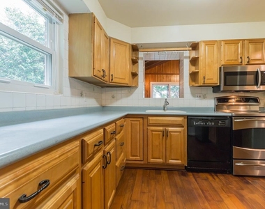 9702 Bellevue Drive - Photo Thumbnail 9