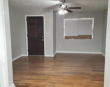 7927 Reid Avenue - Photo Thumbnail 1