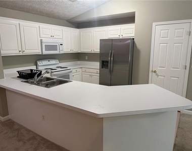 1001 Holly Drive - Photo Thumbnail 4