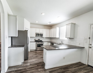 9011 Beacon Mill Drive - Photo Thumbnail 9