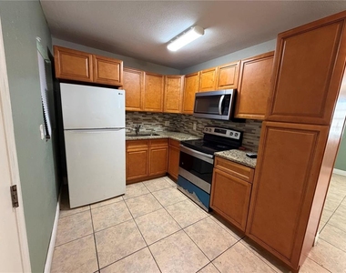 1205 Avenue I - Photo Thumbnail 4