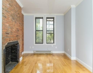 E 6th St. - Photo Thumbnail 1