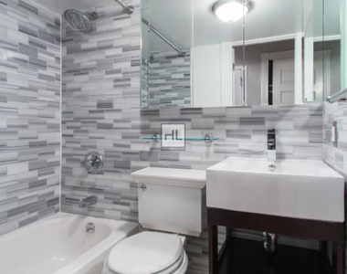 E 6th St. - Photo Thumbnail 2