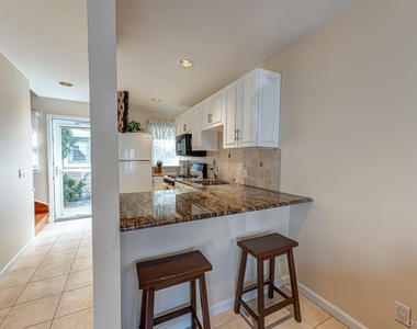 49 Canoe Place Road - Photo Thumbnail 4
