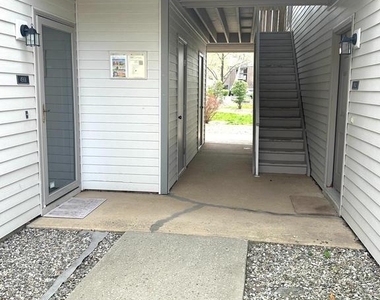 4901 Ravens Crest Drive - Photo Thumbnail 1