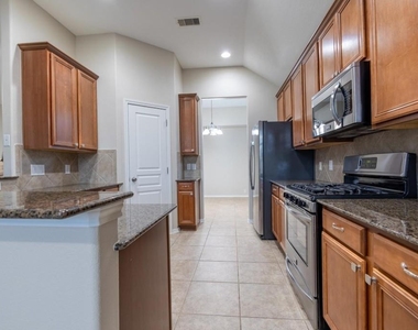 5402 Hickory Harvest Drive - Photo Thumbnail 3