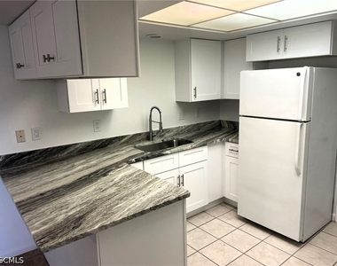 104 Se 16th Place - Photo Thumbnail 1