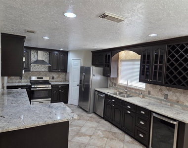 15415 Beechnut Street - Photo Thumbnail 7