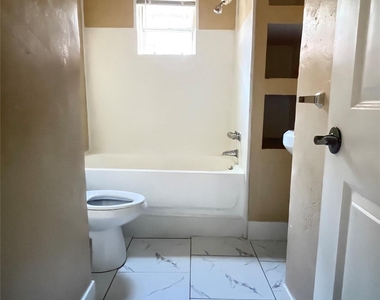 6912 Avenue C - Photo Thumbnail 8
