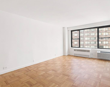  E 16th Street - Photo Thumbnail 2
