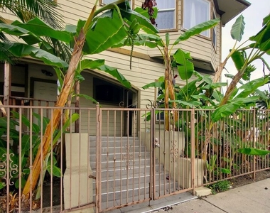 121 N Benton Way - Photo Thumbnail 2