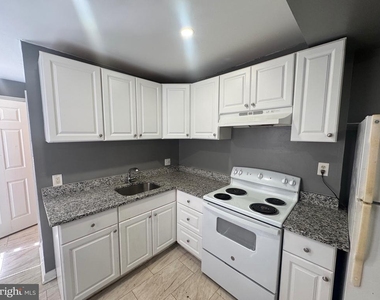 1108 N Bond Street - Photo Thumbnail 4