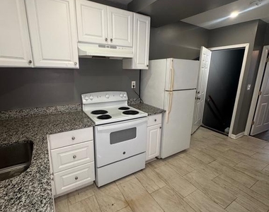 1108 N Bond Street - Photo Thumbnail 16