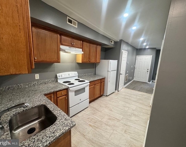 1108 N Bond Street - Photo Thumbnail 12