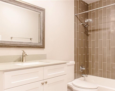 1302 E 52nd St - Photo Thumbnail 5