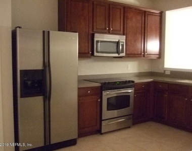 7002 Roundleaf Drive - Photo Thumbnail 1