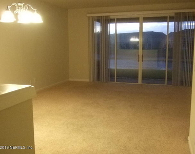 7002 Roundleaf Drive - Photo Thumbnail 3