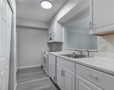 7410 Lake Breeze Drive - Photo Thumbnail 4
