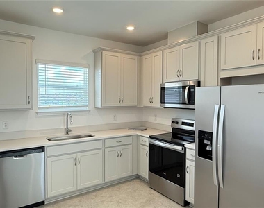 9703 Undset Alley - Photo Thumbnail 6