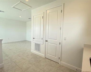 9703 Undset Alley - Photo Thumbnail 8