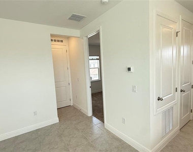 9703 Undset Alley - Photo Thumbnail 12