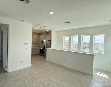 9703 Undset Alley - Photo Thumbnail 5