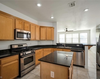 9711 Spinnaker Creek Avenue - Photo Thumbnail 1
