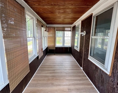 140 E Oneida Street - Photo Thumbnail 3