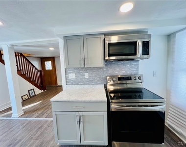 140 E Oneida Street - Photo Thumbnail 6
