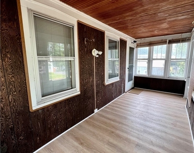 140 E Oneida Street - Photo Thumbnail 4