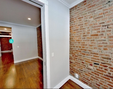 E 13th St. - Photo Thumbnail 4
