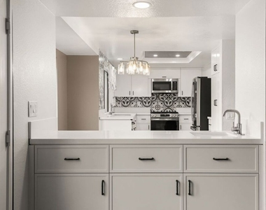 6501 Bradley Place - Photo Thumbnail 20