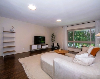 6001 Canterbury Drive - Photo Thumbnail 4