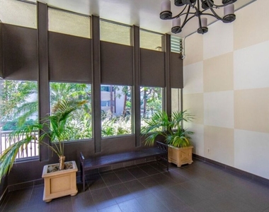 6001 Canterbury Drive - Photo Thumbnail 2