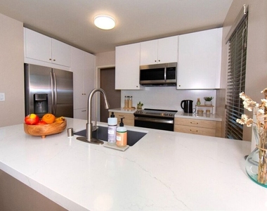 6001 Canterbury Drive - Photo Thumbnail 10