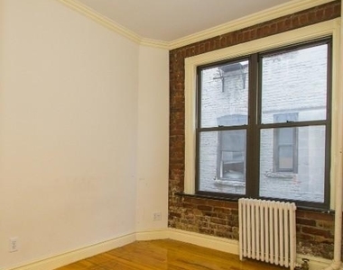E 13th St. - Photo Thumbnail 4