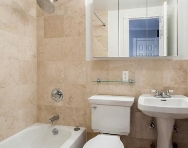 E 13th St. - Photo Thumbnail 5