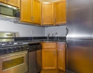 E 13th St. - Photo Thumbnail 1