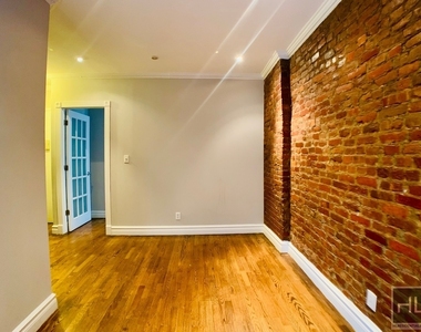 E 13th St. - Photo Thumbnail 2