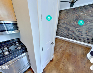 E 13th St. - Photo Thumbnail 1