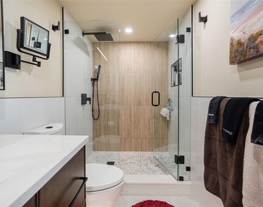 9397 Midnight Pass Road - Photo Thumbnail 16