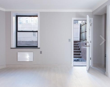 East 11th Street - Photo Thumbnail 2