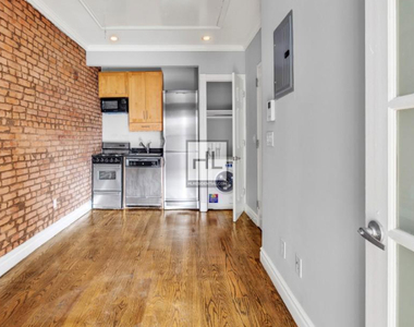 E 5th St. - Photo Thumbnail 1