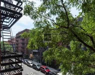 E 5th St. - Photo Thumbnail 4