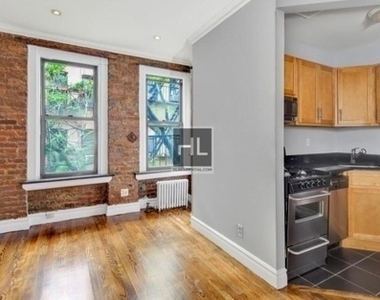 E 13th St. - Photo Thumbnail 1