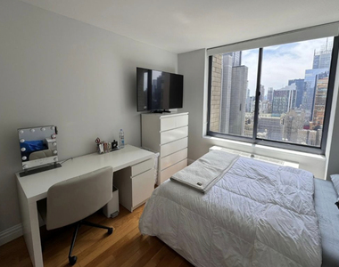  235 West 48th Street - Photo Thumbnail 1